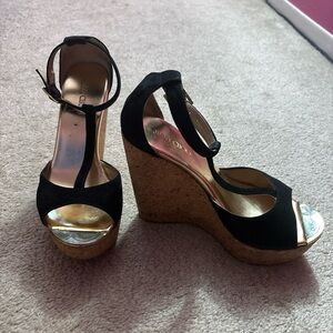 Size 6.5 Jimmy Choo’s Black/gold chunky heels worn a couple times, last picture